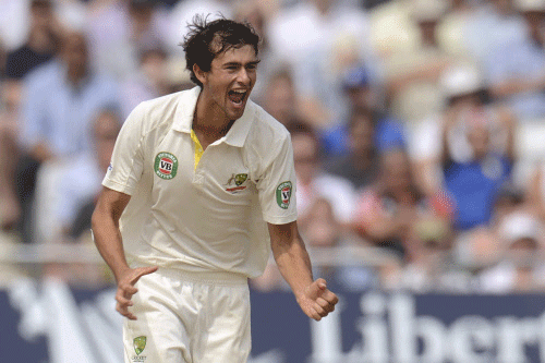 Australia's Ashton Agar celebrates after dismissing England's Jonny Bairstow during the first Ashes cricket test match at Trent Bridge cricket ground in Nottingham, England July 12, 2013. REUTERS