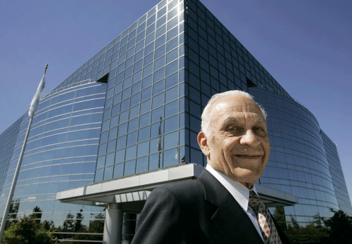 In this Sept. 18, 2007 file photo, Amar Bose, founder and chairman of Bose Corp., the audio technology company, poses in front of the company headquarters, in Framingham, Mass. The company announced Friday, July 12, 2013, that Bose has died. He was 83. (AP Photo