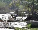 Swollen UP rivers threaten towns