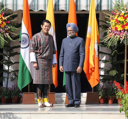 Bhutan King Jigme Khesar Namgyel Wangchuck with Prime Minister Manmohan Singh, during his visit to India on January, 2013. File Photo.