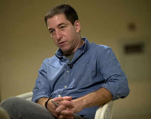 Journalist Glenn Greenwald speaks during an interview with the Associated Press in Rio de Janeiro, Brazil, Sunday, July 14, 2013. Greenwald, The Guardian journalist who first reported Edward Snowden's disclosures of U.S. surveillance programs says the former National Security Agency analyst has 'very specific blueprints of how the NSA do what they do." AP Photo.