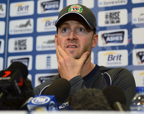 Australia's captain Michael Clarke looks on during a news conference before Thursday's second Ashes cricket test match against England at Lord's cricket ground, London July 17, 2013. REUTERS