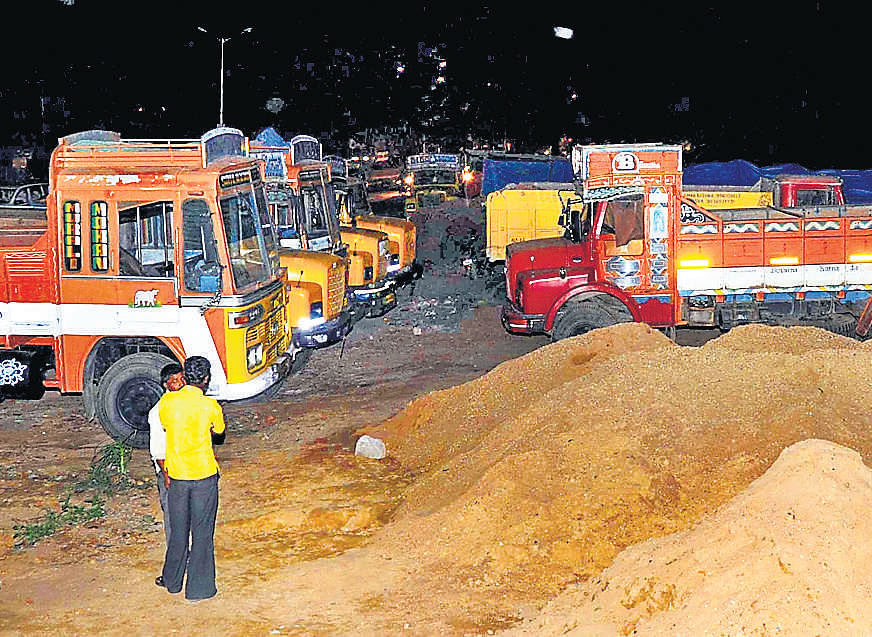 sheer business: Trucks transporting sand are entering City during the night even as the truck operators are on a statewide protest. dh photo