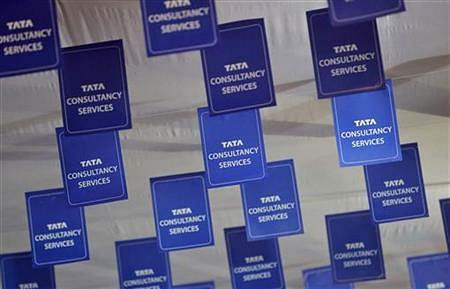 Logos of Tata Consultancy Services (TCS) are displayed at the venue of the annual general meeting of the software services provider in Mumbai, June 29, 2012. Credit: REUTERS