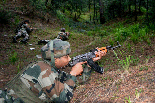 An army soldier takes position during an operation in Keran sector of North Kashmir's Kupwara district to prevent militant attempt to infiltrate from across the border. PTI File Photo
