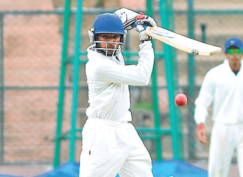 all grace: Abhishek Reddy of Colts en route his 90 in the second innings on Friday. dh photo
