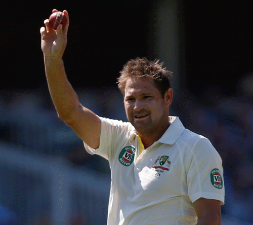 Australia's Ryan Harris reacts to taking 5 England wickets during day 2 of the second Ashes Test at Lord's cricket ground in London, Friday, July 19, 2013. AP Photo