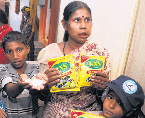 sops or soaps: BPL card holders allege that they were forced at a fair price shop to buy dish washing powder along with the rice for Re one at Tilaknagar. dh photo