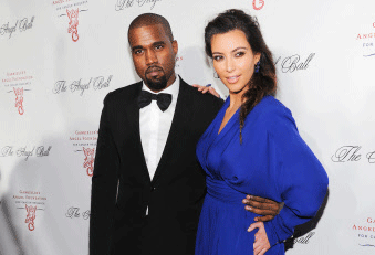 FILE - In this Oct. 22, 2012 file photo, singer Kanye West and girlfriend Kim Kardashian attend Gabrielle's Angel Foundation 2012 Angel Ball cancer research benefit at Cipriani Wall Street in New York. West's new album "Yeezus" isn't as divine as he thought it would be. Though critically-revered, it doesn't have any big singles, anthemic hooks or charismatic lyrics like his past efforts. AP photo