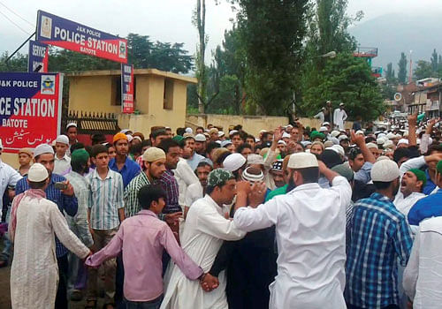 Protesters holding a protest rally over the BSF firing incident at Batote in Ramban district on Friday. PTI Photo