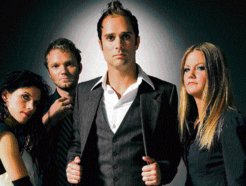Religious rock: Members of the Christian band Skillet.