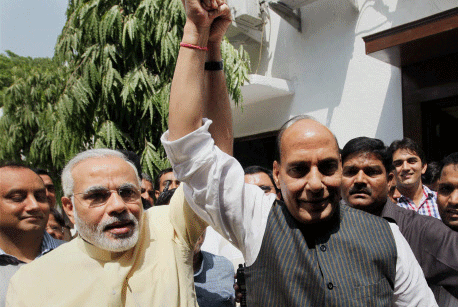 File Photo - BJP President Rajnath Singh with Gujarat CM Narendra Modi after a meeting at his residence in New Delhi on Wednesday (5th June 2013). Party president Rajnath Singh on Sunday announced Modi's elevation as BJP's poll panel chief for the upcoming Assembly elections and the General Elections. PTI Photo