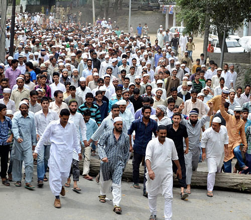 Muslims protesting against the killing of civilians in the BSF firing incident, in Ramban on Friday. PTI Photo