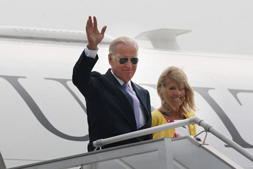 US Vice President Joe Biden waves upon his arrival at AFS Palam in New Delhi on Monday. PTI Photo