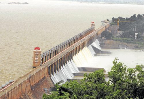 Rain ripple effect: Water being released from all the 10 crest gates of the Tungabhadra reservoir at Hospet in Bellary district on Monday. DH Photo