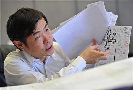 Zhang Yue, founder and CEO of Broad Group, gestures as he talks about his building designs during an interview with Reuters in his office at the company's headquarter in Changsha, Hunan province April 26, 2012. Reuters photo.