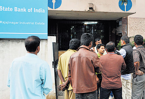 Accidental firing at bank injures customer