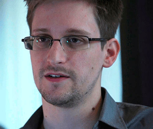 Russia gives Snowden document allowing him to leave airport