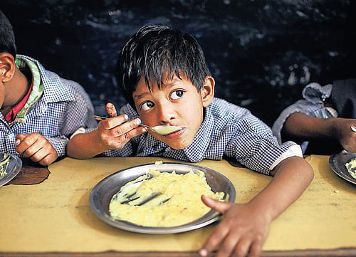 Agencies involved in midday meal scheme have been instructed to ensure better implementation of the programme.  DH Photo