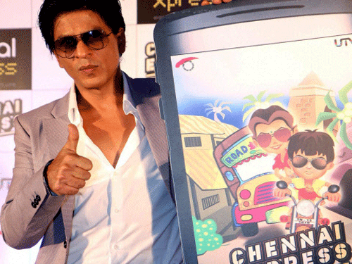 Bollywood actor Shah Rukh Khan promotes his upcoming Hindi film "Chennai Express" directed by Rohit Shetty in Mumbai on Wednesday. PTI Photo