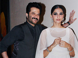 Bollywood actor Anil Kapoor with daughter-actress Sonam Kapoor during the success party of film 'Raanjhanaa' in Mumbai on Wednesday. PTI Photo