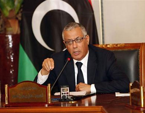 Libyan Prime Minister Ali Zeidan (in pic) , in a televised speech, said that those who fled would be searched by the authorities across the country and ordered closing of the border crossing with Egypt to prevent their further escape. Reuters