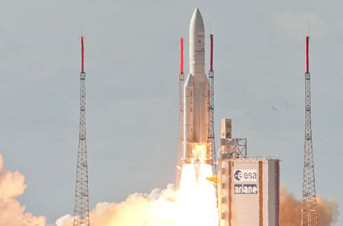 In this photo provided by the European Space Agency (ESA) and taken Thursday July 25, 2013, an Ariane 5 rocket is launched in Kourou, French Guiana. Arianespace's heavy-lift launcher orbited Europe's largest ever telecommunications satellite, Alphasat, and India's latest meteorological spacecraft, INSAT-3D, on the third Ariane 5 mission of 2013. (AP Photo/ESA, CNES, Arianespace)