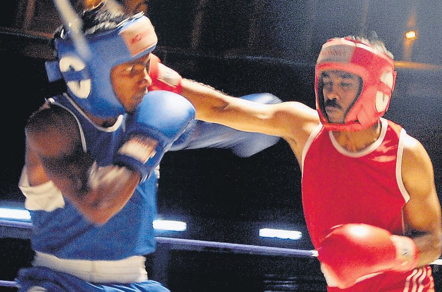 strong blow SAK's Vincent Paul (right) lands a punch on Shanmugam in the Seniors' lightweight category during the State Boxing Championships on&#8200;Sunday. DH PHOTO