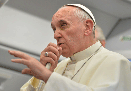 Pope says he won't judge gay priests. File AP Photo