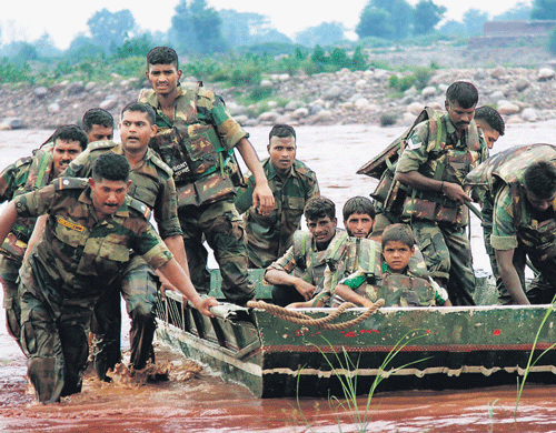Army personnel rescue villagers caught in flash floods in Jammu