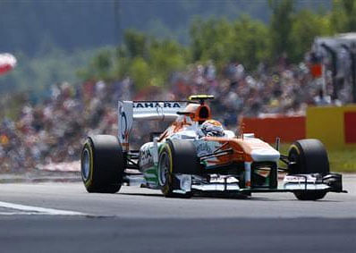 Force India Formula One driver Adrian Sutil of Germany drives during the qualifying session for the German F1 Grand Prix at the Nuerburgring circuit, July 6, 2013. Reuters