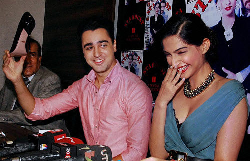 : Bollywood actors Imran Khan and Sonam Kapoor at the unveiling of Stardust magazine cover in Mumbai on Monday. PTI Photo