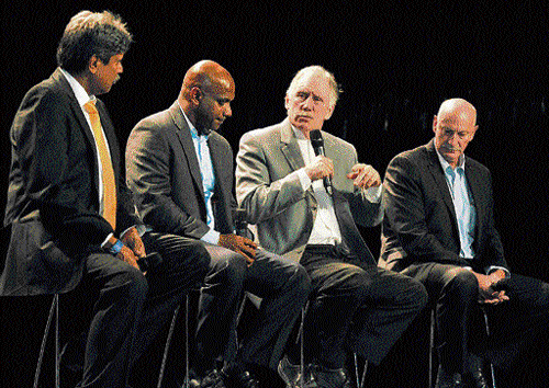Masterminds: From left: Kapil Dev, Sanath Jayasuriya, Ian Chappell and Dennis Lillee  discuss a point during the launch of the World Cup, 2015, at Melbourne on Tuesday. reuters
