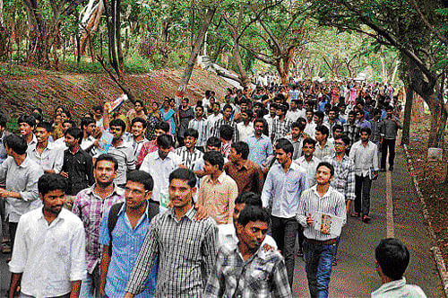 Students hold a protest march against the creation of separate Telangana state, in Vishakhapatnam on Wednesday;