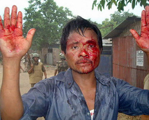 Violence erupted in Assam's Karbi Anglong hills district on Wednesday as supporters of separate state for 'Karbi tribal' involved in clashes with police and CRPF at the district's head quarter, Diphu. PTI Photo