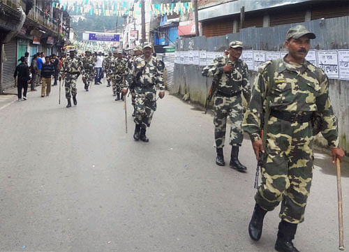 CRPF personnel patrol during indefinite strike called by the Gorkha Janamukti Morcha (GJM) demanding a separate state in Darjeeling on Sunday. PTI Photo