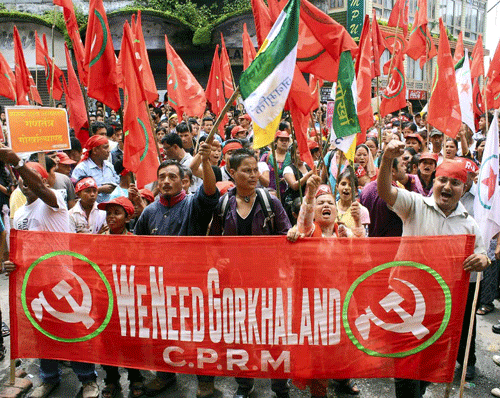 GJM suppoters take out a rally in Kalimpong on Sunday, in Darjeeling Hills for Gorkhaland. PTI Photo