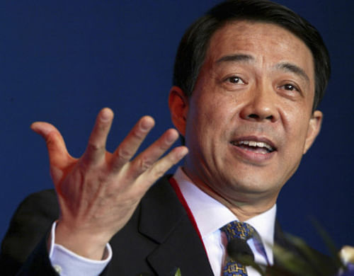 Bo Xilai, then Governor of Liaoning Province, gestures as he delivers a speech at the China Entrepreneur Annual Meeting in Beijing, in this December 7, 2003 file photo. The trial of disgraced senior Chinese politician Bo will start on Thursday, Xinhua state news agency said, when he will face charges of bribery, corruption and abuse of power in an early test of new President Xi Jinping's campaign against graft.  Reuters Image.