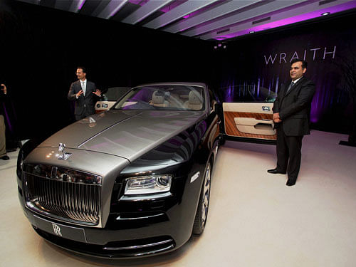 Herfried Hasenoehrl (L), General Manager for Emerging Markets-Asia, Rolls-Royce at the launch of their new new car Wraith in New Delhi on Monday. PTI Photo