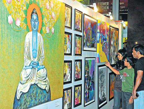 artistic: Visitors at the show.