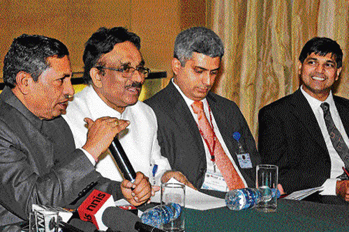 (From left) Union Minister of State for MSMEs K H Muniyappa, IACC Chairman S Krishna Kumar and Director Madhu  Kiran address the Transcending Arabian Borders (TAB) conference held in Bangalore on Friday. DH Photo