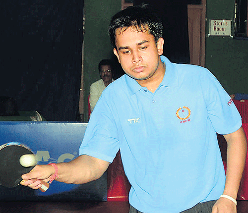 on song: PSPB's Soumyajit Ghosh in action in the inter-institutional table tennis in Dharwad on Friday. DH&#8200;photo