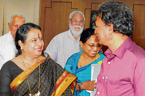 culturescope: Chairman for the cultural policy drafting committee, Baragur Ramachandrappa (right) interacts with Kannada and Culture Minister Umashree at a press conference in Bangalore on Friday. Writer Bhanu Mushtaq and theatre personality D K Chowta are seen. dh photo