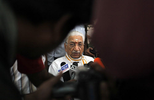 Ashok Singhal, leader of Vishwa Hindu Parishad addresses the media before leaving for Delhi in Allahabad, India, Friday, Aug. 23, 2013. The Uttar Pradesh state government has denied permission for the VHP organised procession scheduled to start on Aug. 25 from Ayodhya, citing security reasons. AP