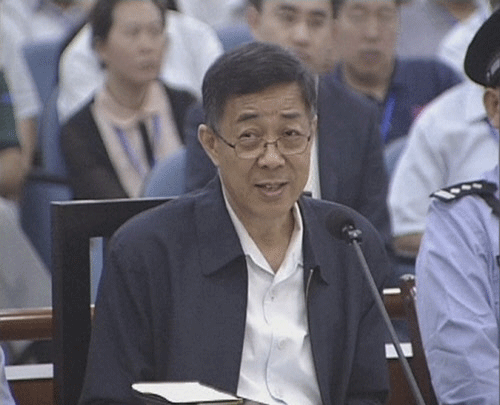 Ousted Chinese politician Bo Xilai speaks in court on the third day of his trial in Jinan, Shandong Province, in this still image taken from video shot on August 24, 2013. Bo Xilai accepted responsibility for 5 million yuan ($817,000) in funds he is accused of embezzling which ended up in his wife's bank account, saying he had let his attention wander, in testimony read out in court on Saturday. Bo, once a rising star in China's leadership, is facing charges of corruption, bribery and abuse of power. REUTERS