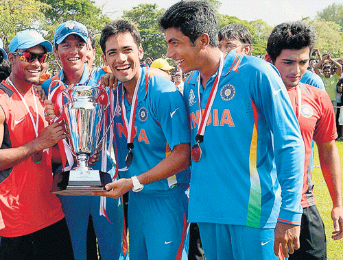 bleeding blue: India U-23 players celebrate after clinching the ACC Emerging Trophy in Singapore on Sunday. ap