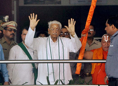 VHP Chief Ashok Singhal was taken into custody at Lucknow Airport on Sunday as the State Government launched a massive crackdown against those planning to join the 'Chaurasi Kosi Parikrama' in Ayodhya. PTI Photo