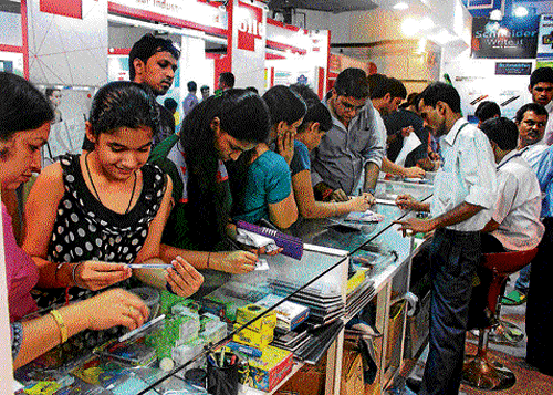 enthusiast: Young crowd thronged to the ongoing 15th Stationery Fair at Pragati Maidan.