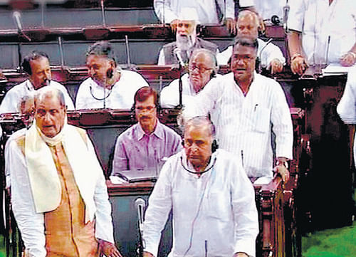 Samajwadi Party President Mulayam Singh Yadav and other MPs in the Lok Sabha on Monday.  PTI