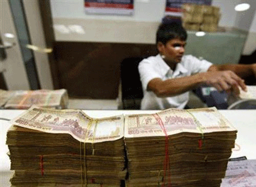 Rupee breaches 66-mark against dollar, down 176 paise
